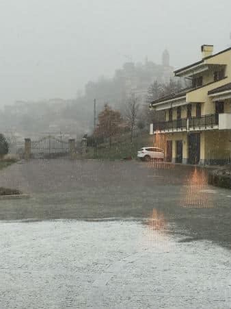 Snow falling outside Giacomo Conterno